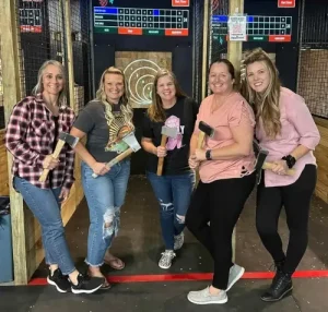 axe throwing fun with projected targets and games in Jacksonville, Florida.